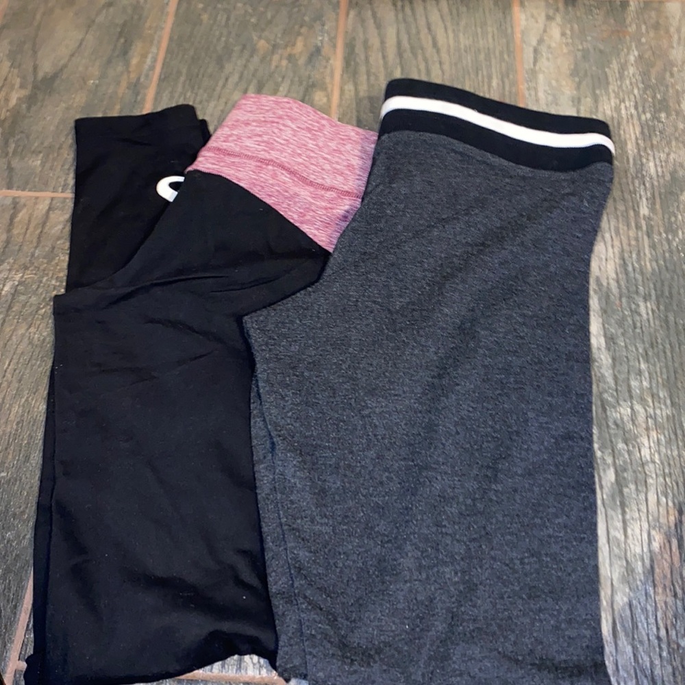 -2 pairs of pink leggings